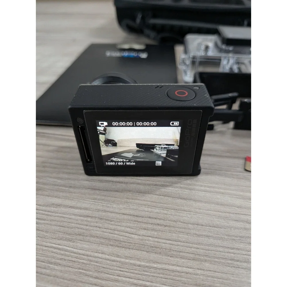 GoPro Hero 4 Silver Edition- with Accessories and Case Included